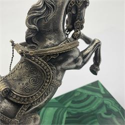 Modern silver model of a rearing horse, with ornate parcel gilt saddle and bridle, mounted upon a rectangular base, decorated with malachite panels to each side and upon four gilt bun feet, horse stamped 925, overall H14.5cm