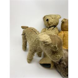 Quantity of early wood wool filled teddy bears for restoration.