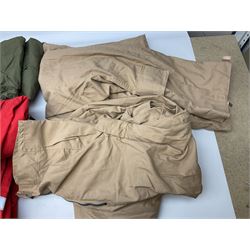 Quantity of modern military clothing including shirts, Flying suits, T-shirts, thermal underwear, water-proof clothing for mountain rescue use, pair of French leather para boots, Bergen back pack etc; some issued in Kuwait for desert use; much unused.