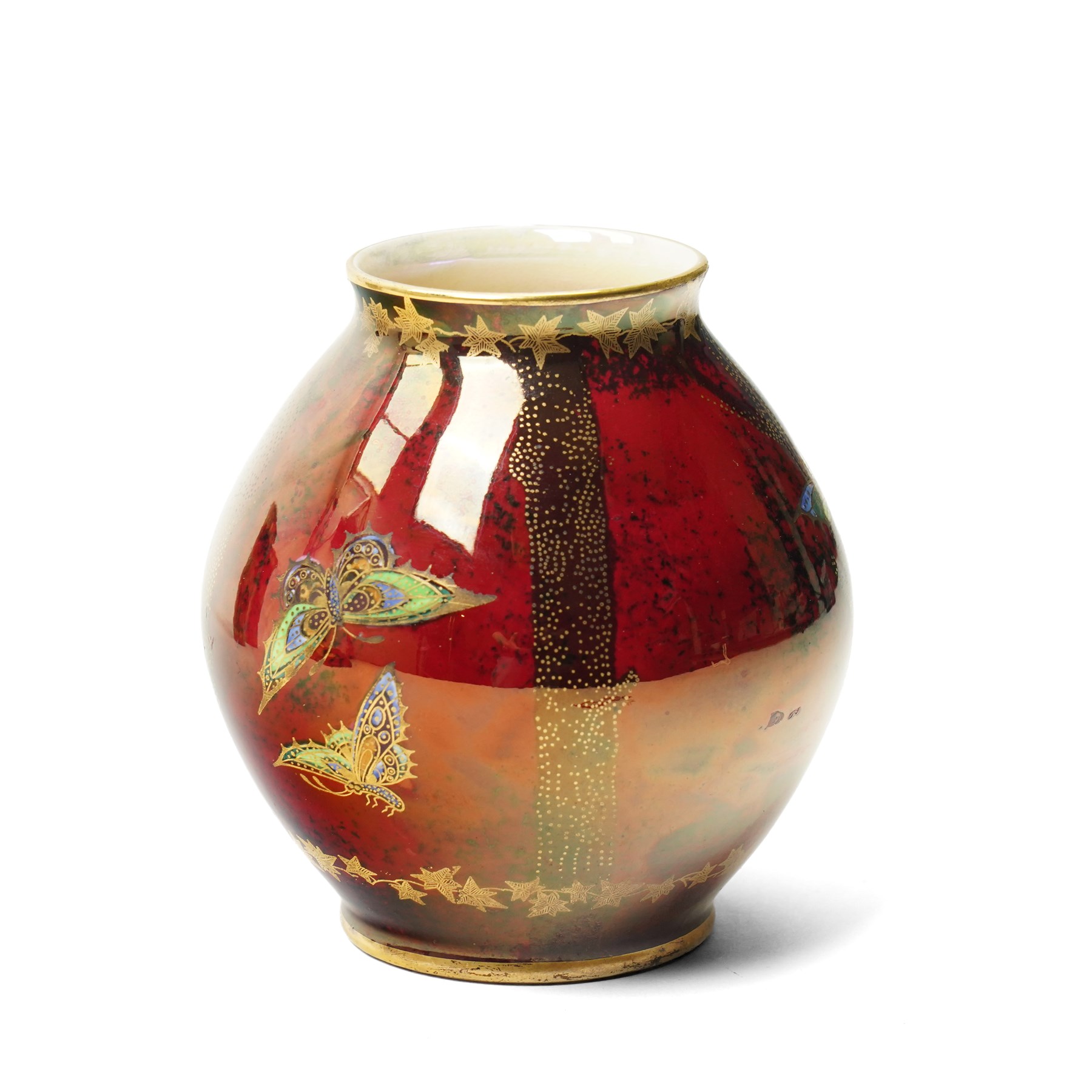 Four pieces of Fielding's Devon Lustrine, comprising a small pair of sleeve vases, H15cm; a bowl and vase, each decorated with butterflies and leaves in gilt on a red ground, printed marks beneath (4)