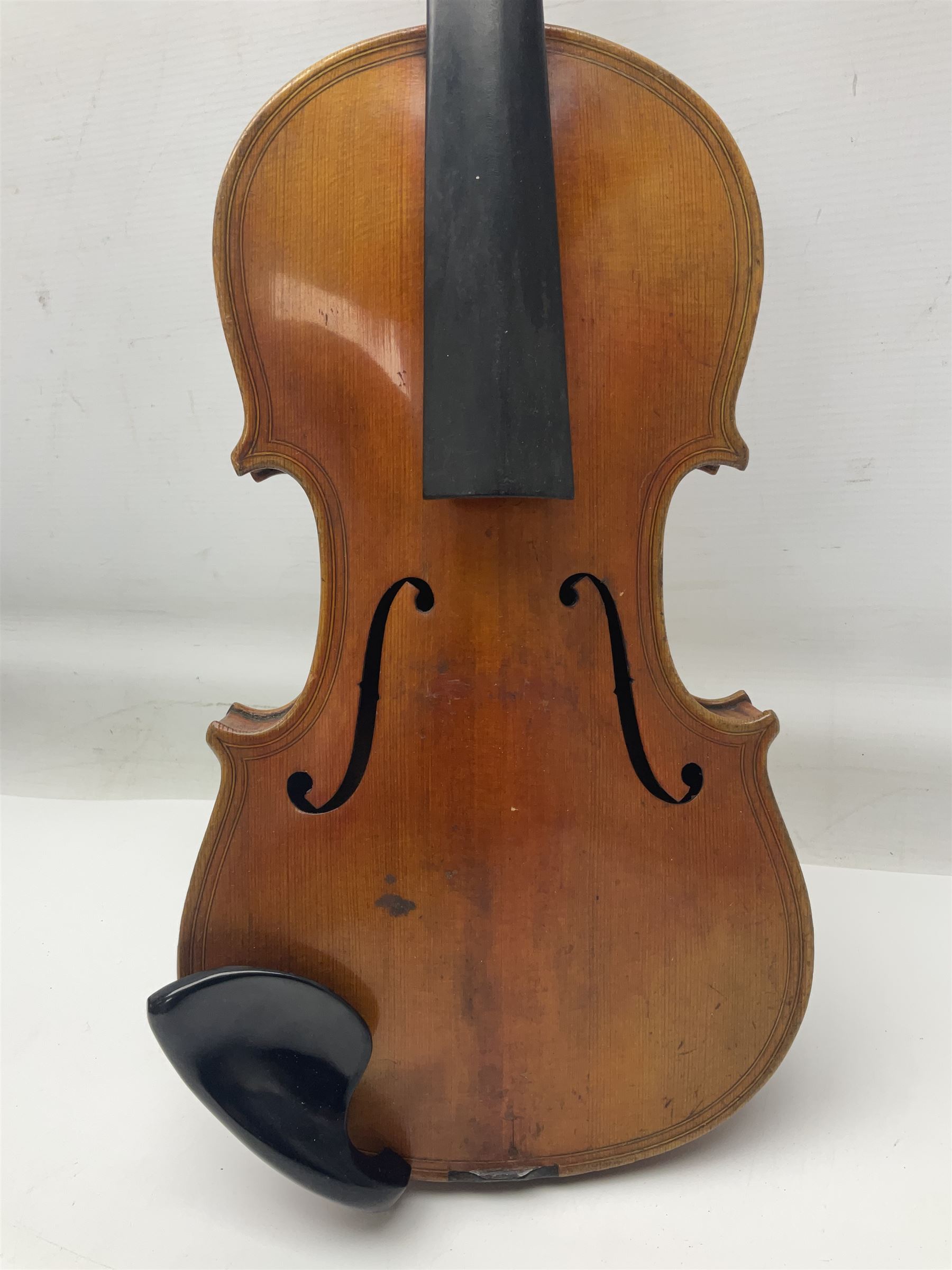German trade violin c1900 copy of a Maggini with 36.5cm two-piece maple back and ribs and spruce top; double scroll; L60cm overall; in carrying case