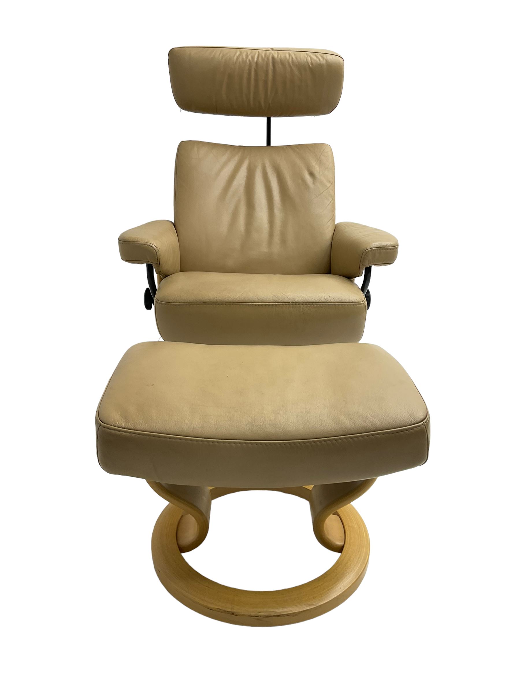 Ekornes Stressless - reclining armchair upholstered in latte leather, with footstool