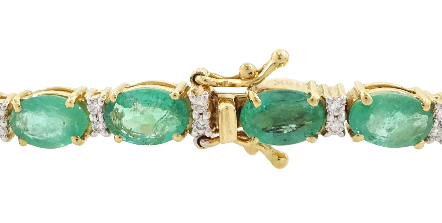 18ct gold emerald and diamond bracelet, twenty-seven oval cut emeralds, each spaced by two round brilliant cut diamonds, stamped 18K, total emerald weight approx 12.35 carat, total diamond weight approx 0.50 carat