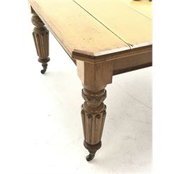 *Edwardian oak telescopic extending dining table, canted rectangular top with moulded edge, on turned supports with mounts and brass cups and castors, no additional leaves, 120cm x 135cm, H75cm