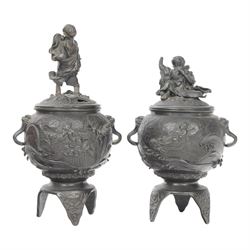 Pair of Japanese bronze koro, raised upon three feet, he body of the koro decorated with figures and animals, the cover mounted with figures, H24cm