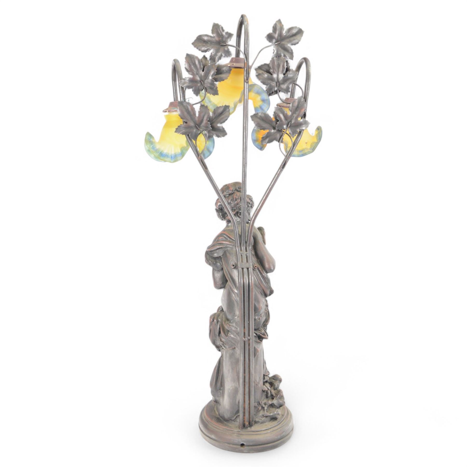 20th century composite figural table lamp with three floral moulded glass shades, H88cm