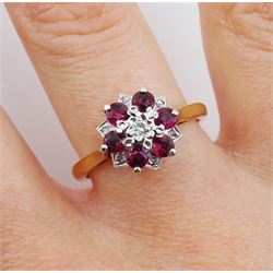 9ct gold round brilliant cut diamond and garnet cluster ring, London 1975