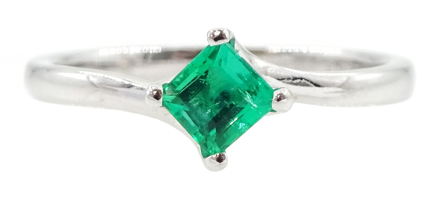 18ct white gold emerald ring, four claw set with a single square cut emerald of approx 0.30 carat, stamped 750