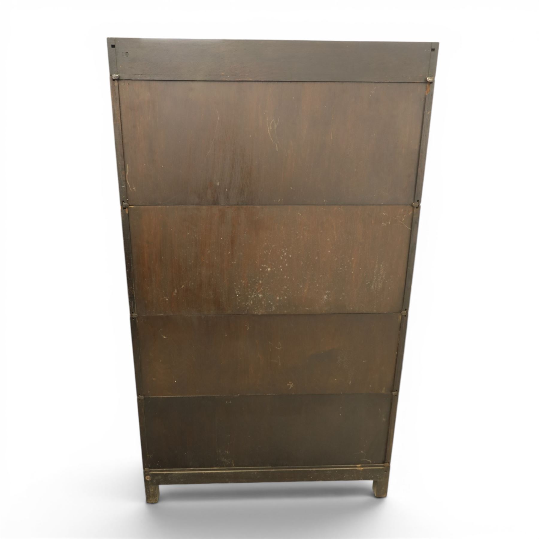 Harris Lebus - oak barrister stacking bookcase, four tier design with glazed fronts with brass knobs, raised on claw and ball feet