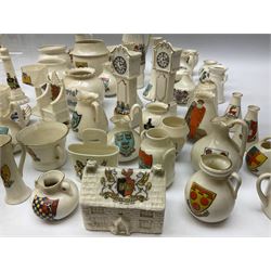 Collection of crested ware, predominantly W H Goss, to include tile/teapot stand with a verse from Adolphus Goss, model of a Norwegian horse shaped beer bowl, horseshoe, cow bell etc, together with other crested ware etc 