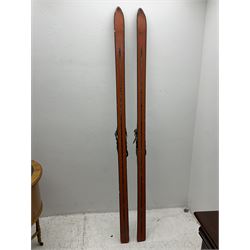 Pair of 1930s wooden skis, with painted metal runners beneath stamped Attenhofer, with retailers label for Ernst Gertsch Central Sports, L206cm