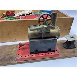 Mamod small stationary steam plant with circular saw bench and grinder mounted on long wooden board L107cm; and quantity of predominantly red/green Meccano in wooden box with die-cast models etc