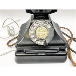 Vintage Bakelite black telephone, with chrome dial, pull out number tray and plinth H20.5cm. 