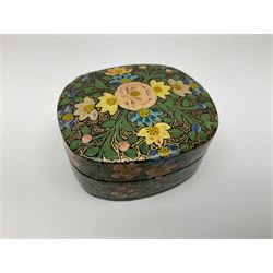 Ten lacquered boxes including oval and rectangular examples, with floral and foliate decoration, largest L20cm, D6cm
