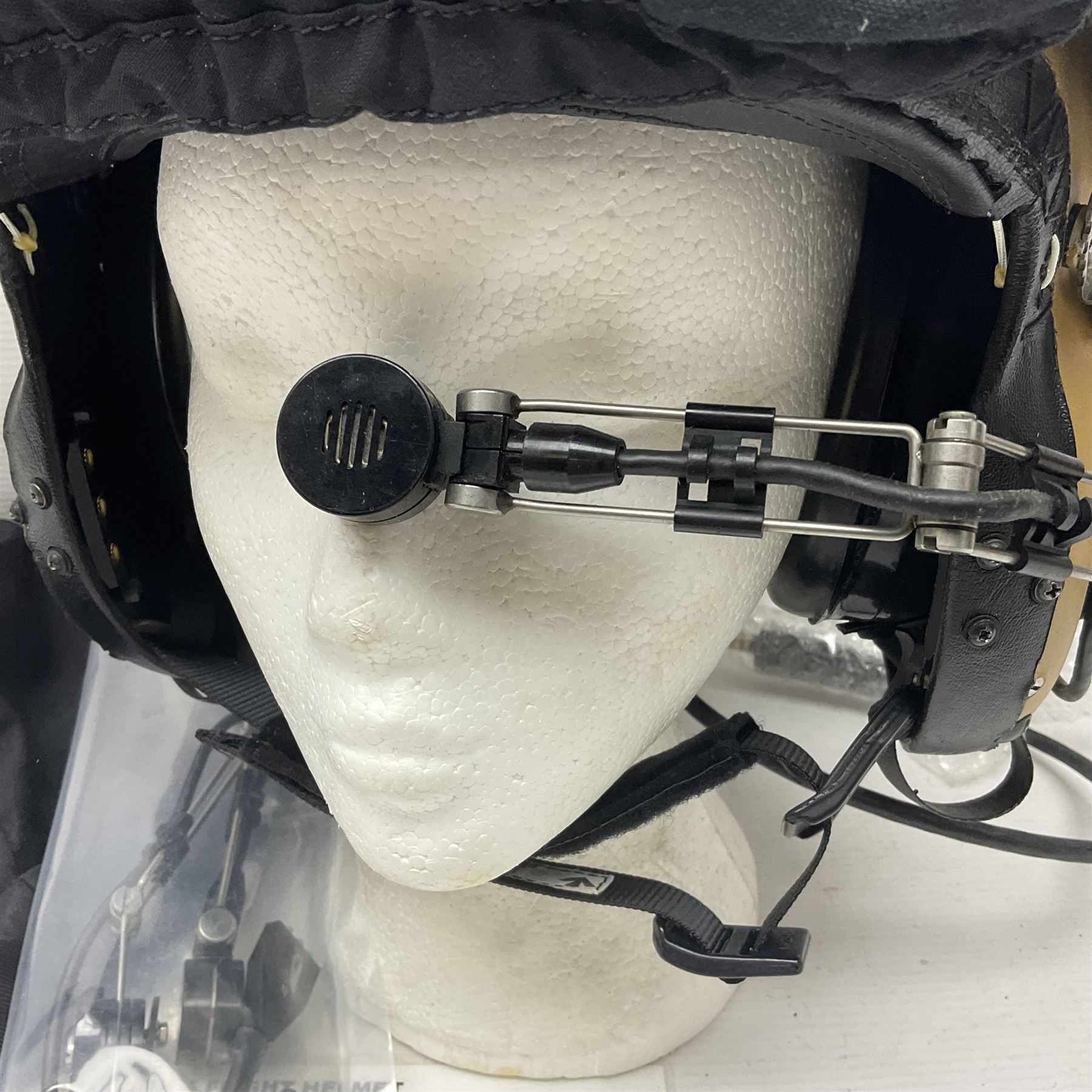 Mk.4 Flight Helmet, as used by RAF and Civilian helicopter pilots; in RAF sand colour (desert use),  fitted with cloth visor cover and working boom mike; has had a complete refit and is bench tested.