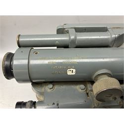 Cooke Troughton & Simms grey painted brass dumpy level in carrying case; and WW2 British .303 Vickers Machine Gun brass Clinometer, stamped 'V.E. 0067' serial No. 2370,  dated 1944 unboxed (2)