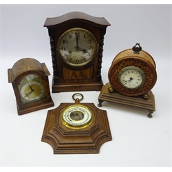  Oak cased mantle clock silvered dial flanked by barley twist columns, H31cm, walnut cased mantle clock with arched top, circular roman numeral dial, quartz mantle clock and oak cased barometer (4)  