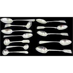 Group of mostly Georgian and Victorian silver spoons, to include pair of bright cut engraved condiment spoons, hallmarked Thomas Wallis II, London 1799, three fiddle pattern teaspoons with engraved monogram to terminals, hallmarked Charles Boyton (II), London 1974, fiddle pattern sauce ladle, hallmarked John Stone, Exeter 1845, various other examples including Old English pattern, etc., various hallmarks, dates ranging 1798 to 1884, approximate total silver weight 5.62 ozt (175 grams)
