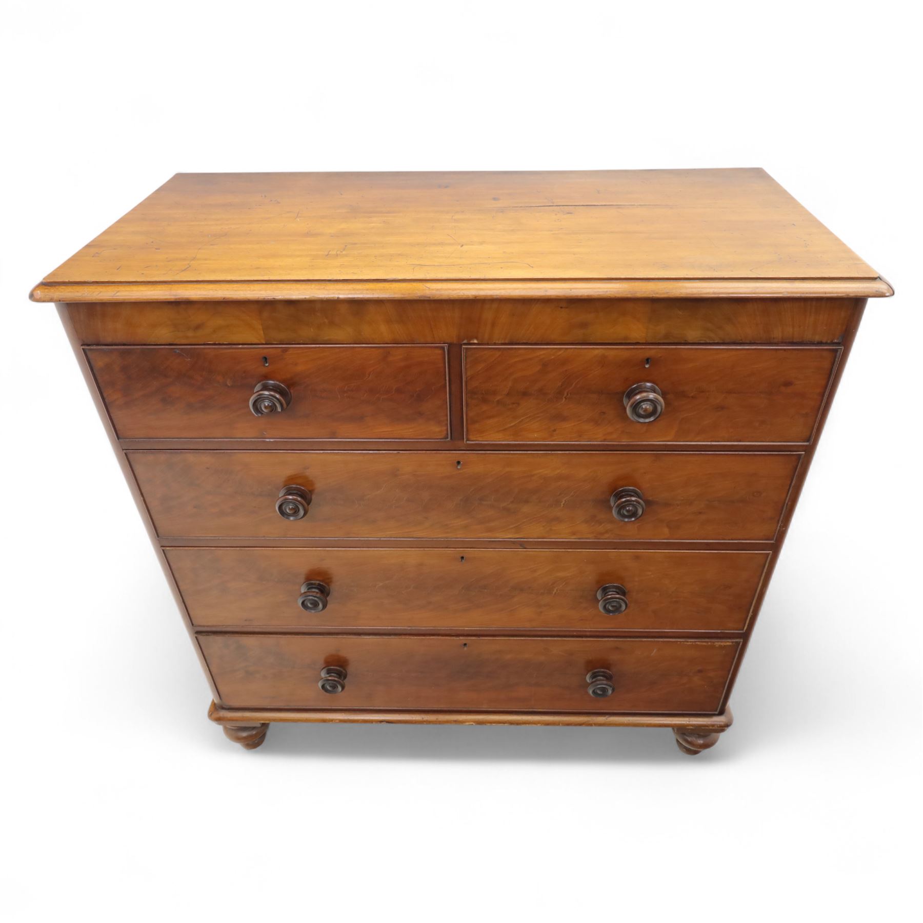 Victorian flamed mahogany chest, fitted with two short and three long drawers, turned wooden handles, raised on bun feet