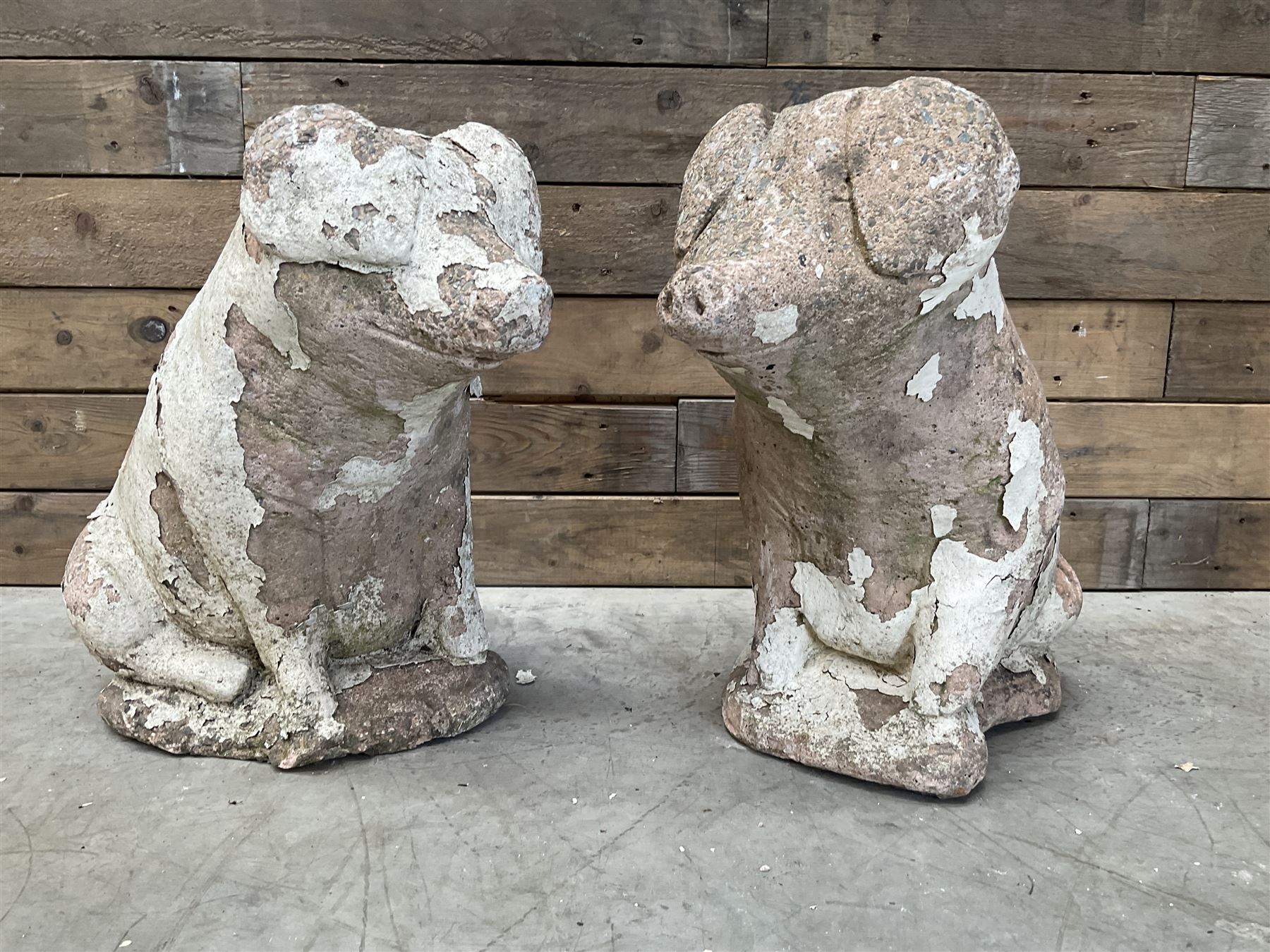 Pair painted stone pigs 