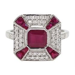 White gold ruby and diamond cluster ring, the central emerald cut ruby, with round brilliant cut diamond and calibre cut ruby surround, stamped 18K, total ruby weight approx 1.00 carat, total diamond weight approx 0.50 carat