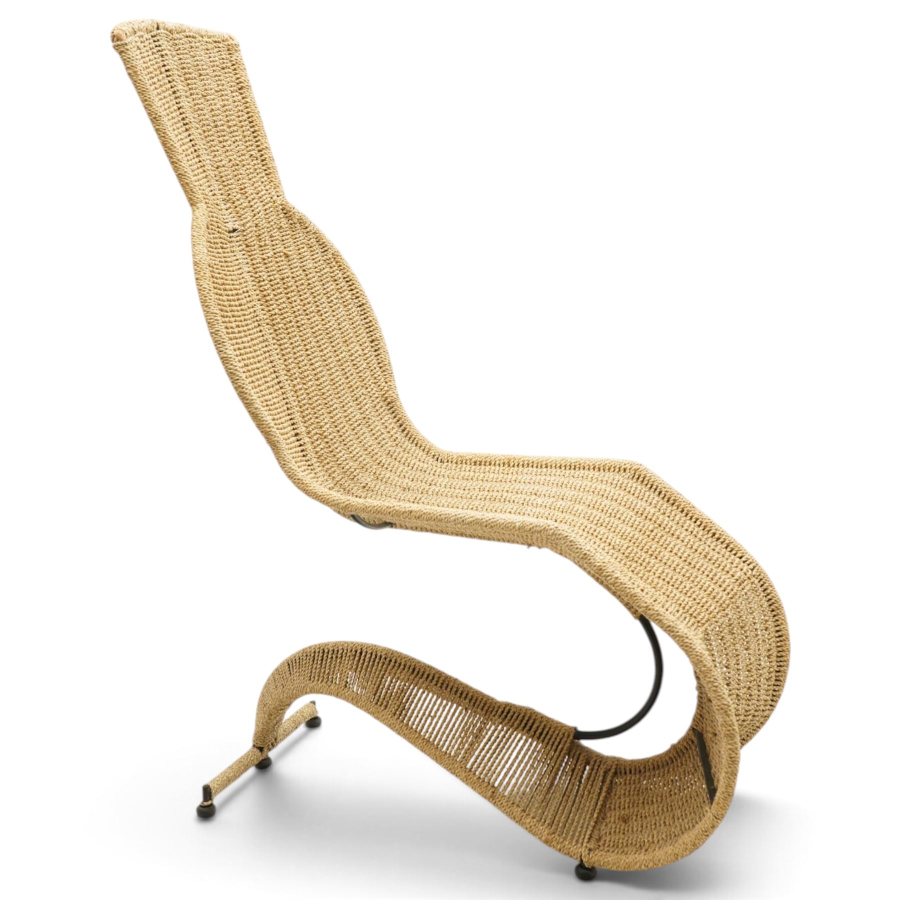 Tom Dixon (1959-) for Space Design - 1990s woven rattan lounge chair, exaggerated S-shaped profile with integrated seat, back and headrest, on concealed tubular metal framework and curved rattan-clad supports