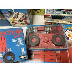 Fischer Technik/Lego/Playmobil - thirteen model building sets comprising eight Fischer Technik sets 50, 50/1, 50v, 50/2, 50+mot1 and two 50S, 50/1 add-on pack, with spare parts packs 01, 03, 05, two 22 and 30; two Lego sets comprising C107 and Lego Systems 103, part-set 870 and 970; Playmobil no.3520 set; four boxes of loose lego, various instruction manuals and a scrapbook 