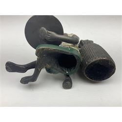 Bronze figure of a seated man resting on a sack