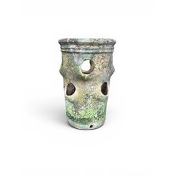 Set of five weathered terracotta strawberry pots, circular form with ribbed top