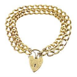 14ct gold double curb link bracelet, with 9ct gold heart lock clasp hallmarked
