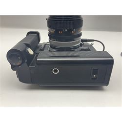 Canon A-1 camera body, serial no. 341014, with 'Canon FD 50mm 1:1.4 S.S.C.' lens, serial no. 12077119 and motor drive MA