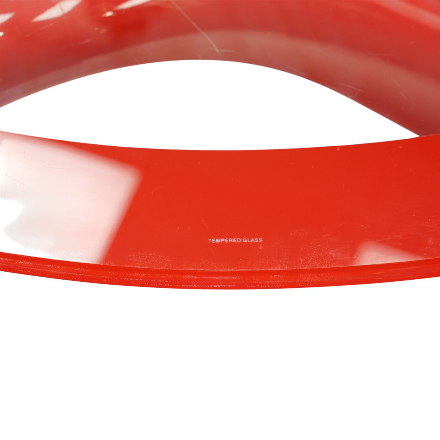 Italian post-modern design coffee table, oval glazed top with red banding over a shaped base of female form