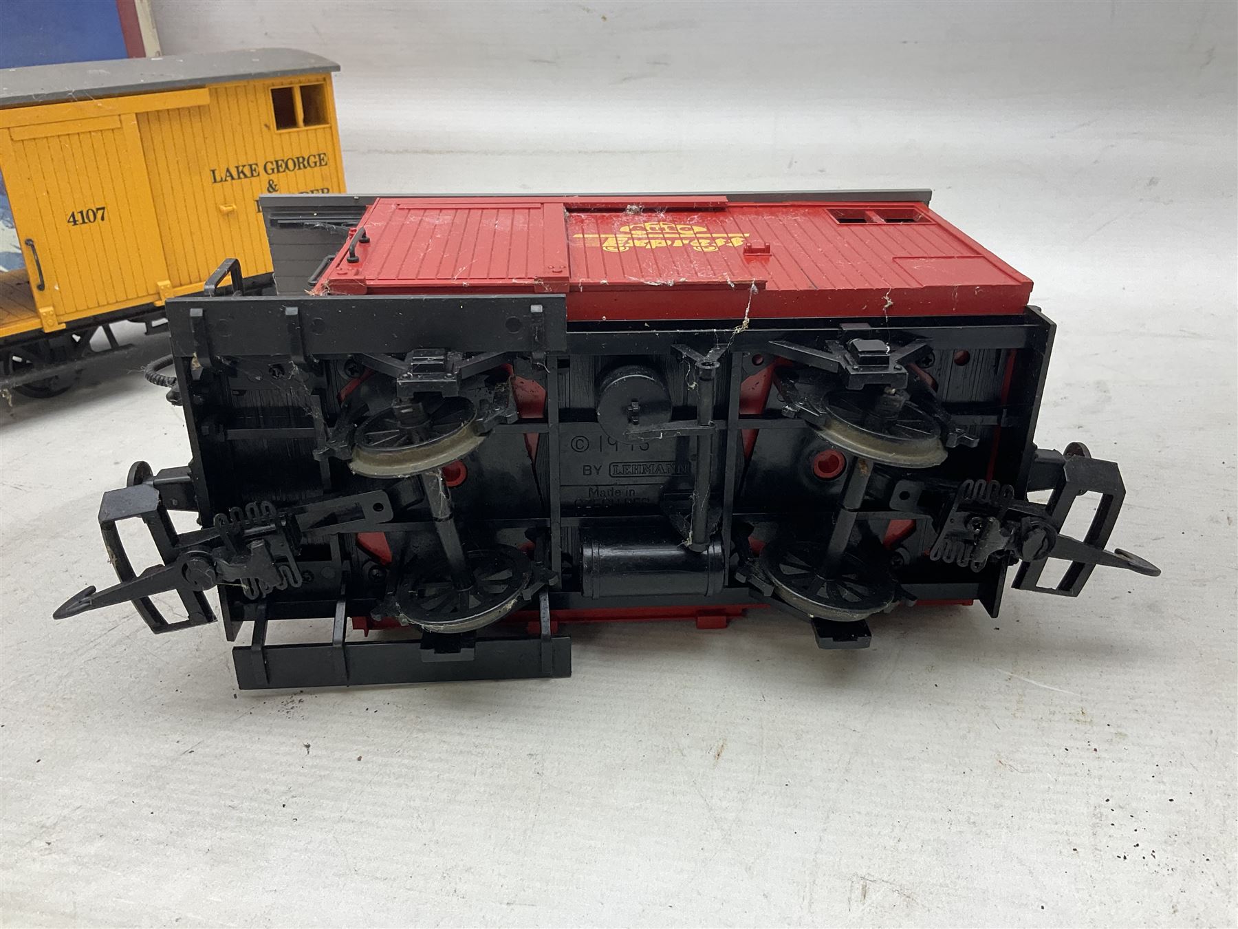 Three LGB (Lehmann Gross Bahn) G scale, gauge 1, rolling stock wagons, comprising two Lake George and Boulder wagons and an Auto Express wagon, together with a LGB passenger coach, other LGB rolling stock and a Lehmann Rigi900 ski lift