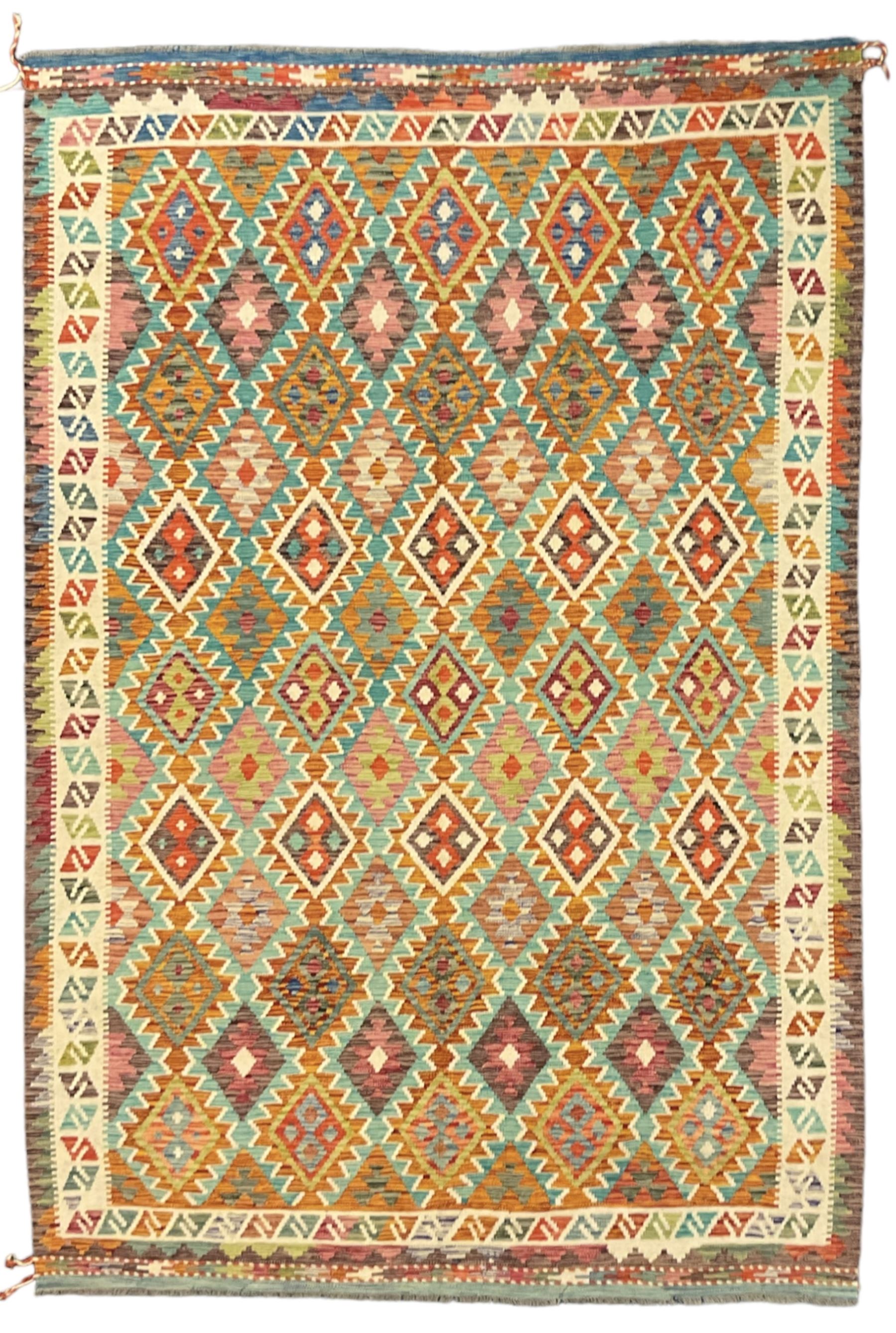 Anatolian Turkish Kilim multi-colour rug, decorated with all over lozenges in contrasting colours with ivory outline, the multi-band ivory border with repeating geometric shapes and small lozenges or diamonds