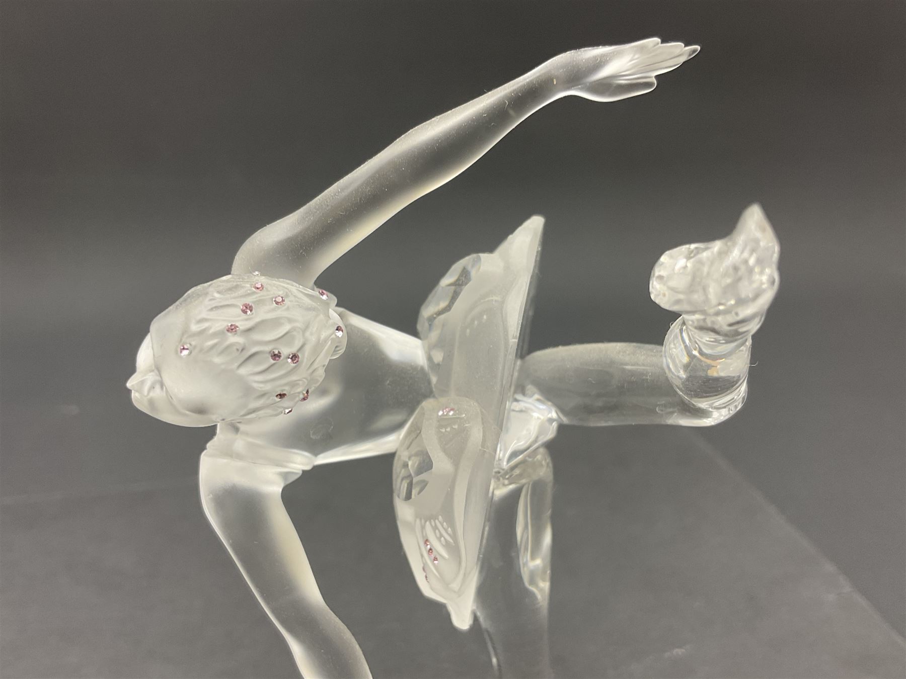 Three Swarovski figures, comprising flamenco dancer, female dancer with certificate and ballerina, tallest H21cm  