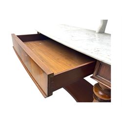 Mid-19th century mahogany washstand, the serpentine white marble top with raised gallery back and central shelf above a frieze drawer, supported by turned columns united by a shaped undertier, raised on bun feet