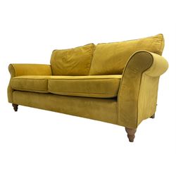 Next Furniture - traditional shaped three-seat sofa, upholstered in mustard velvet, rolled arms with pipping, on turned front feet