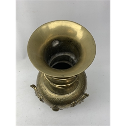 A large Chinese brass vase, of ovoid form with tall neck and flared rim, decorated in relief with dragons chasing a flaming pearl, and further incised with clouds and other detail, the base with relief dragon detail and character mark, H41