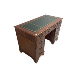 Yew wood twin pedestal desk, fitted with eight drawers, inset leather writing surface