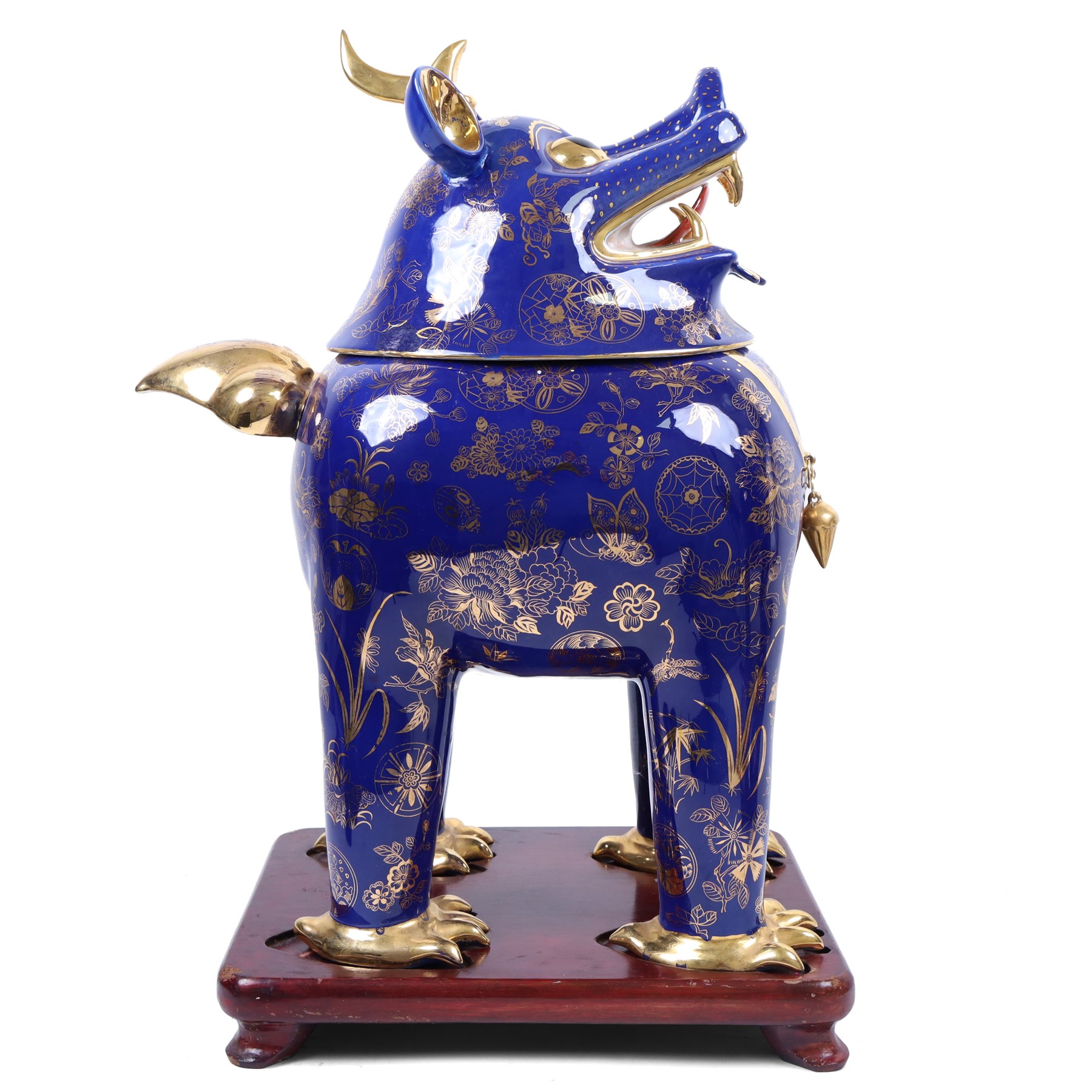 Pair of 20th century foo dog incense burners, decorated with gilt flowers and insects upon a blue ground, on wooden stands, H58cm 