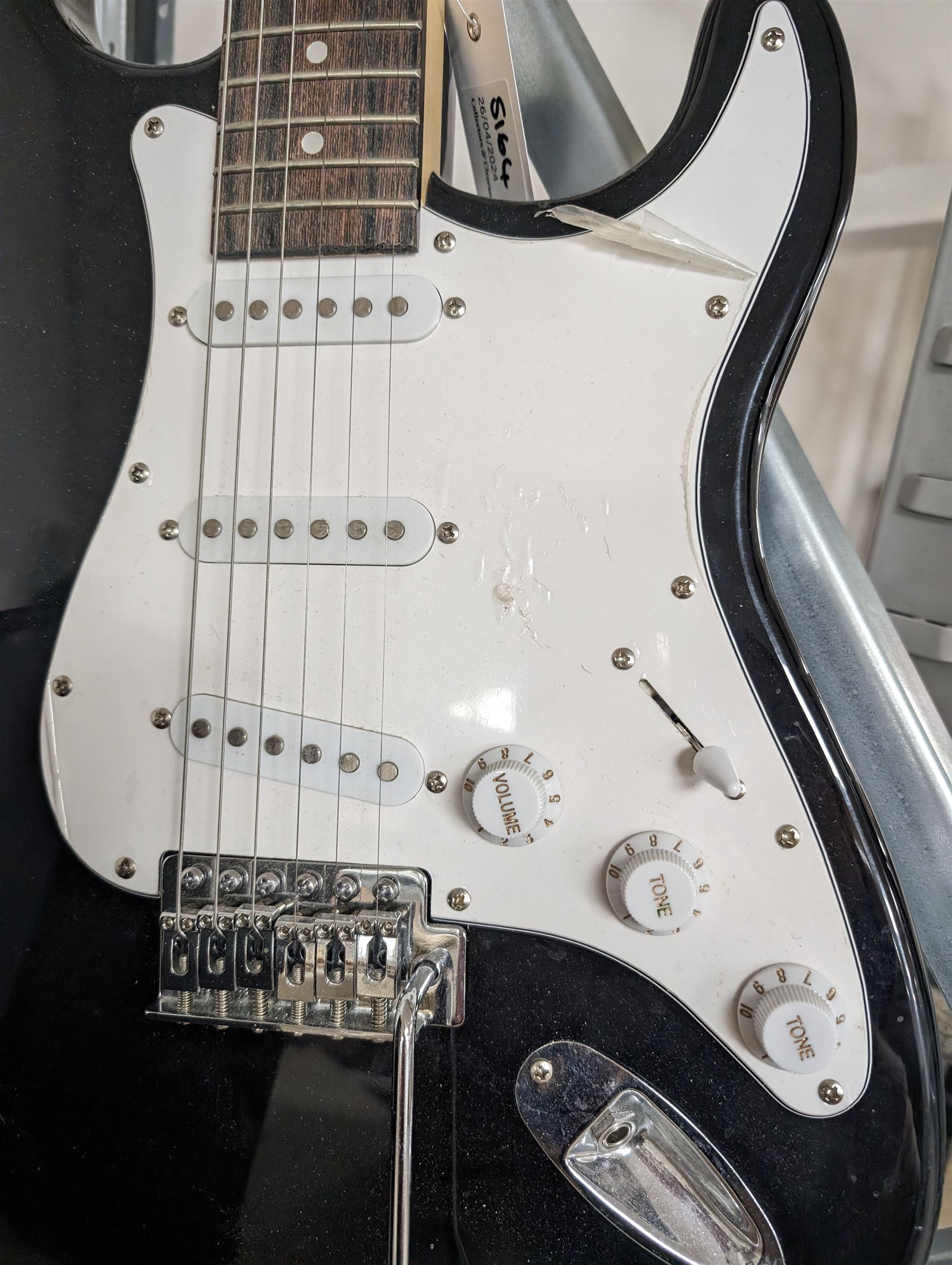 Rock Jam six string electric guitar, together with a Rock Jam amplifier and an Atrics guitar