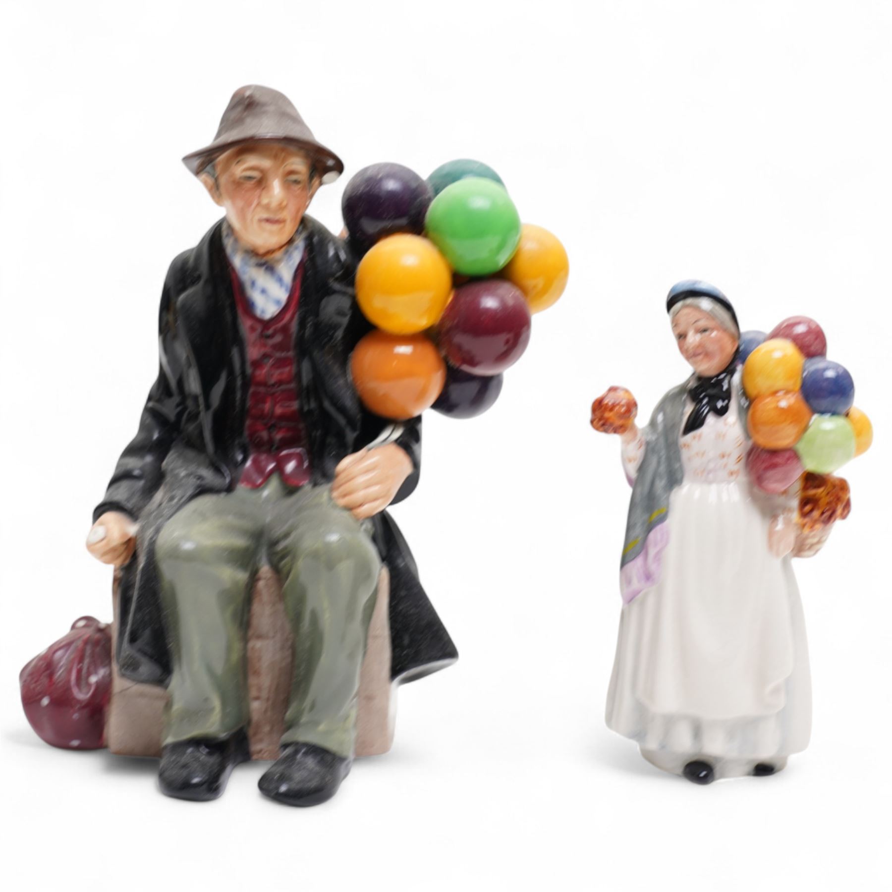 Six Royal Doulton figures, including Balloon Lady HN2935, The Orange Lady HN1759, Silks and Ribbons HN2017 and The Balloon Man HN1954 
