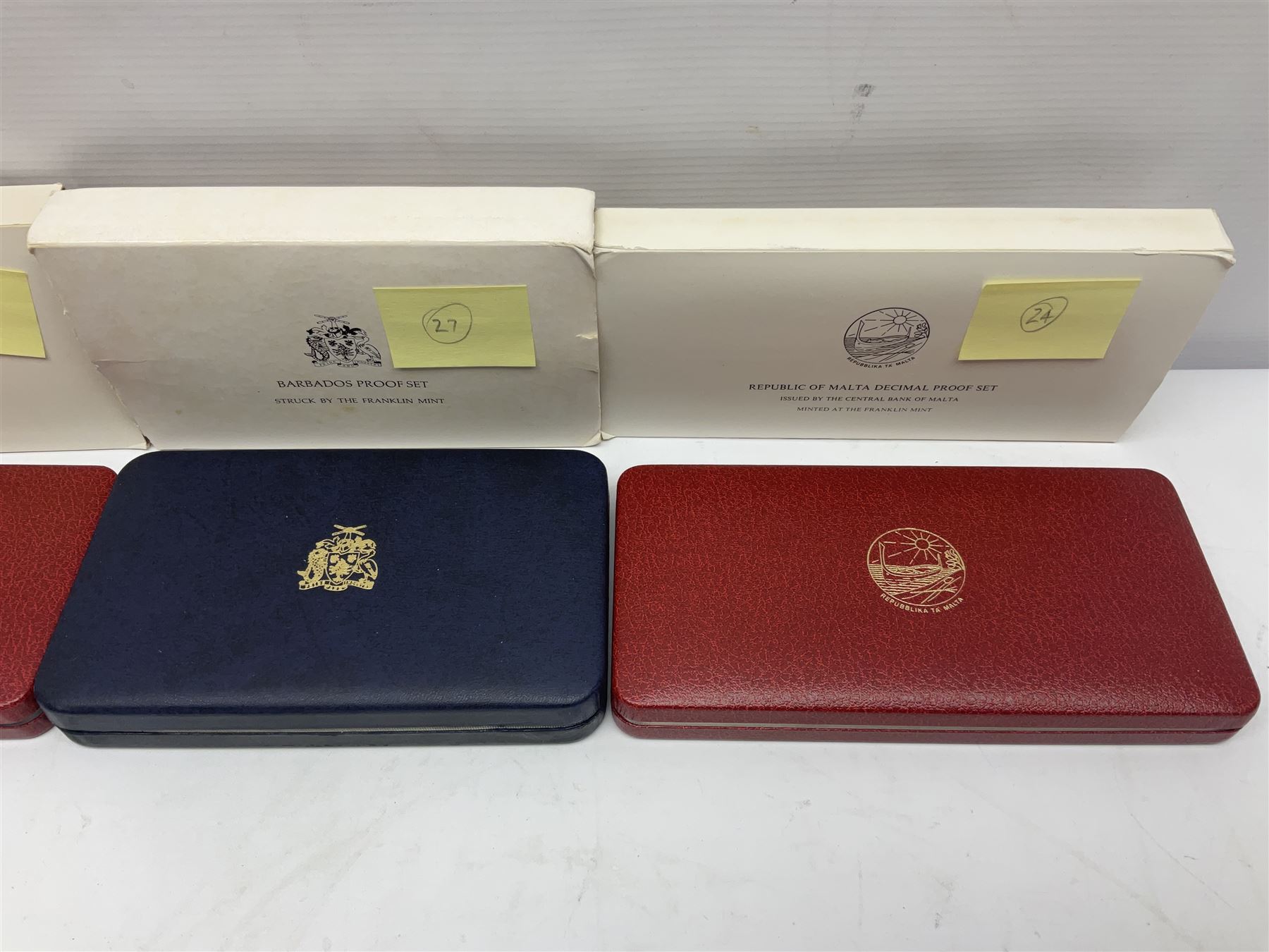 First National Coinage of Barbados 1973 proof eight coin set, from ten dollars to one cent, the ten dollar coin minted in sterling silver, the five dollar coin minted in 800 silver, and a Barbados 1974 proof eight coin set, both minted at The Franklin Mint, cased with certificates; two Republic of Malta decimal proof coin sets, dated 1978 and 1979, the 1979 one pound coin minted in sterling silver, both minted at The Franklin Mint, cased with certificates; Cayman Islands 1973 proof eight coin set, minted at the Royal Canadian Mint, cased; and a Cayman Islands 1979 proof eight coin set, the five dollar to fifty cents coins each minted in sterling silver, minted at the Franklin Mint, cased with certificate (6)