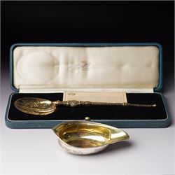 George III silver pap boat with gilded interior London 1799 and a silver gilt copy of the ...