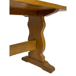 Beaverman - oak coffee table, adzed rectangular top, burr oak shaped supports on sledge feet joined by pegged stretcher, by Colin Almack of Sutton-under-Whitestone Cliffe