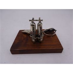 Silver mounted scuba diving paperweight, modelled as a silver oxygen tank, scuba mask and flippers, stamped 925, upon a rectangular wooden base, H5.5cm