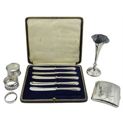 Group of silver, comprising early 20th century cigarette case with engraved monogram to cover, hallmarked Deakin & Francis Ltd, Birmingham 1912, two early 20th century napkin rings, Victorian napkin ring, late Victorian specimen vase, and cased set of five Edwardian tea knives with silver handles, approximate gross weight 10.19 ozt (317 grams)