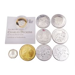 Silver coins including two Queen Elizabeth II 2016 ‘Year of the Monkey’ 1oz fine silver coins, 2005 1oz fine silver Britannia, 2012 ‘Charles Dickens’ silver proof two pound coin with certificate and five other silver coins 
