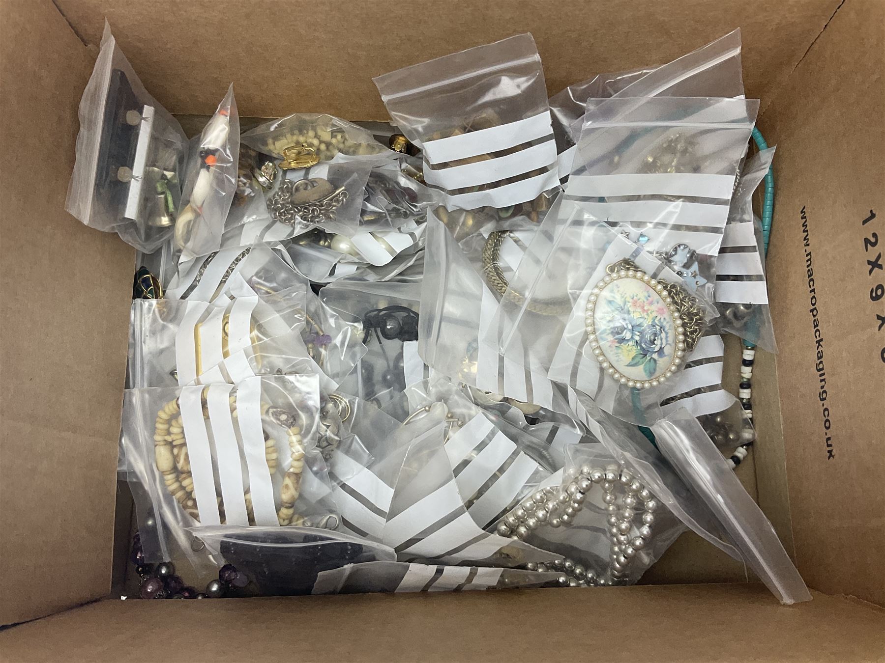 Silver necklace, compact mirror with lipstick holder and a collection of costume jewellery 