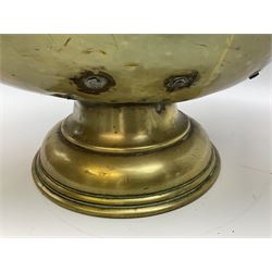 Victorian brass helmet shaped coal scuttle with embossed decoration and turned wooden handle and shovel, H49cm